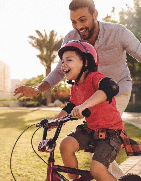 Little Boy Learning to Ride Bicycle