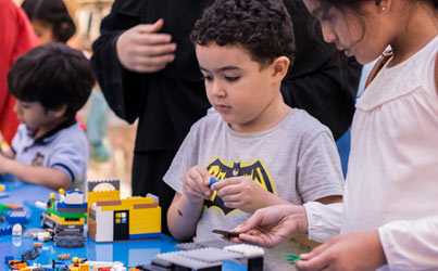 Boy Playing Lego